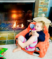 03_15a AM With No Power - Myra Lilou Lounging by Fire, Playing with Lena, Pretending Flower is a Trumpet, and Scooter Monkey Park Cuteness